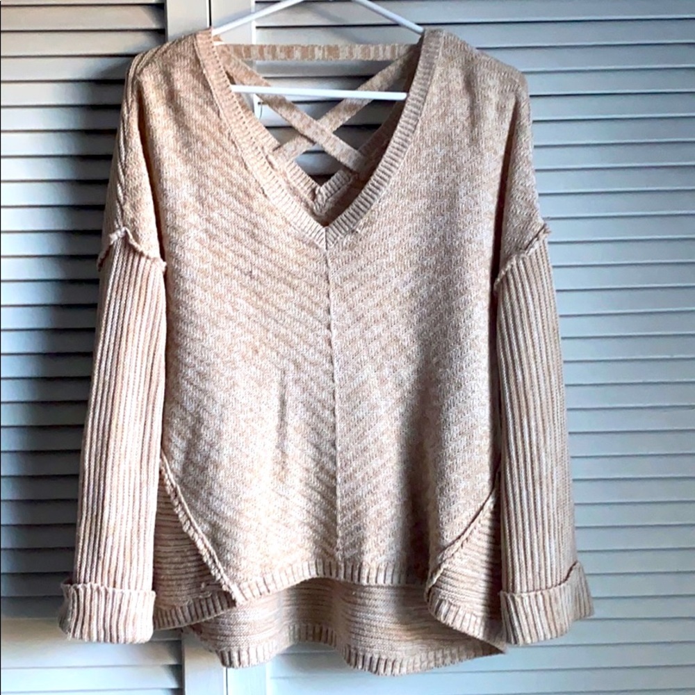 Cross back cable knit sweater